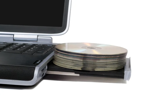 Laptop com unidade de DVD sobrecarregada. Isolado — Fotografia de Stock
