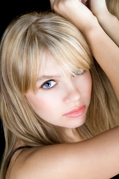 Portrait of the attractive young blonde Stock Picture