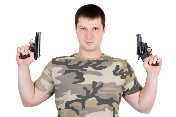 Genç adam bir iki tabancayla. izole — Stok fotoğraf