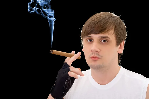 Porträtt av den unge mannen med en cigarr — Stockfoto