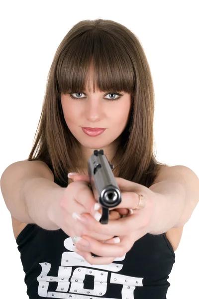 Mooi meisje in een vest met pistool — Stockfoto