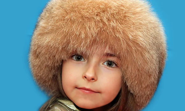 The girl in a fur cap — Stok fotoğraf