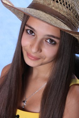 Portrait of girl is in a cow-boy hat. clipart