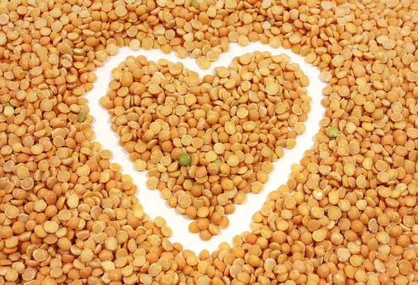 Background is a dry pea and heart — Stock Photo, Image