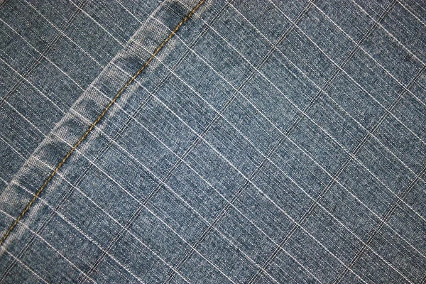 Tekstura tkanina dżinsy w rogu paska — Zdjęcie stockowe