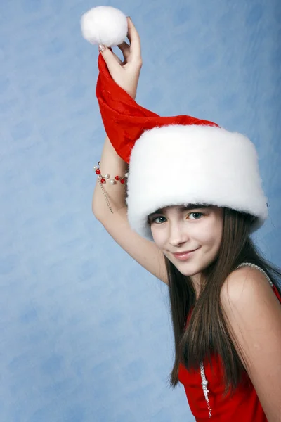 Girl is in the Christmas cap. — Stok fotoğraf