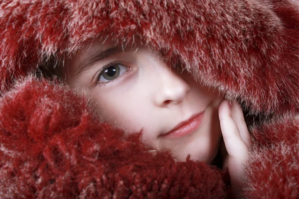 A portrait of girl is in red fur. — Stock Photo, Image