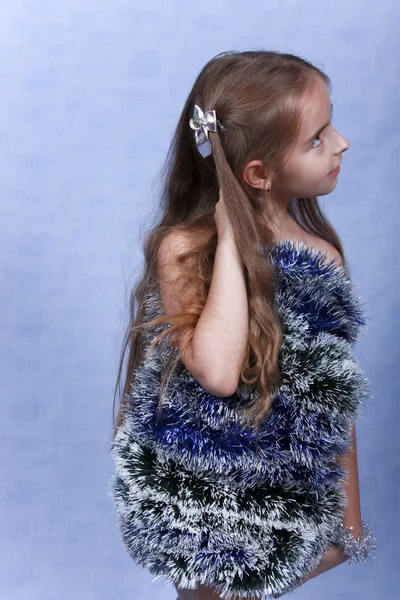 Girl is in the unusual Christmas clothes — Stock Photo, Image