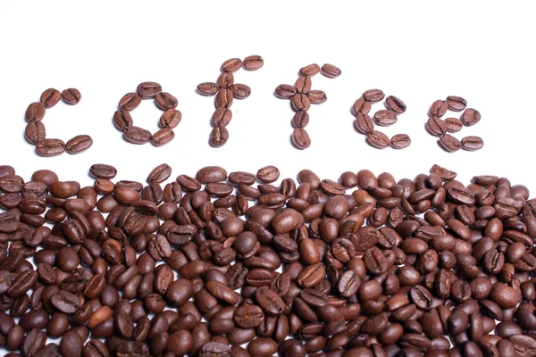 Kawa słowo napisane z ziaren kawy. — Zdjęcie stockowe