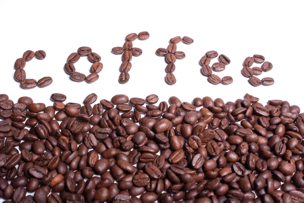 Kaffe ord skrivet från kaffebönor. — Stockfoto