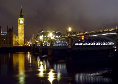 Big Ben and Westminster bridge at night clipart