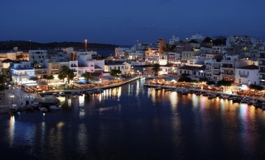 Night panorama of Aghios Nikolaos town i clipart