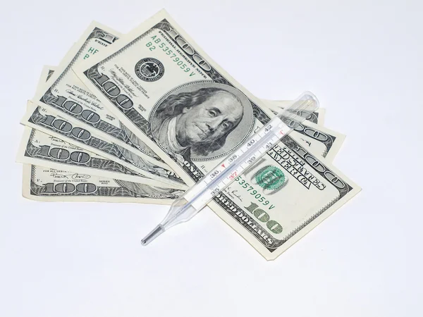Dollar with a thermometer — Stock Photo, Image
