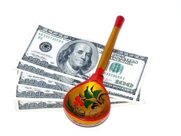 Painted spoon and US dollars on a white — Stock Photo, Image