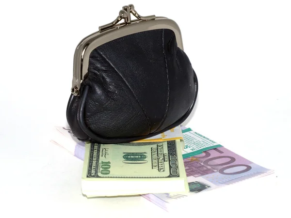 Para birimi paketleri üzerinde beyaz bir bac ile çanta — Stok fotoğraf
