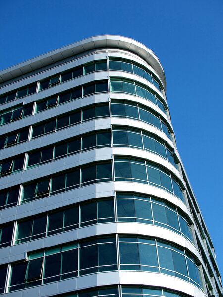 Modern office centre against the blue sky