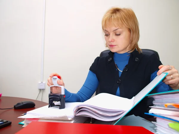 The bookkeeper works with documents
