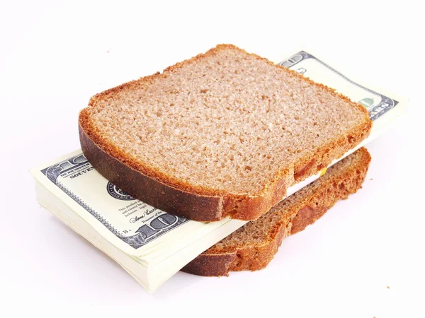 Měnová sendvič na bílém pozadí — Stock fotografie