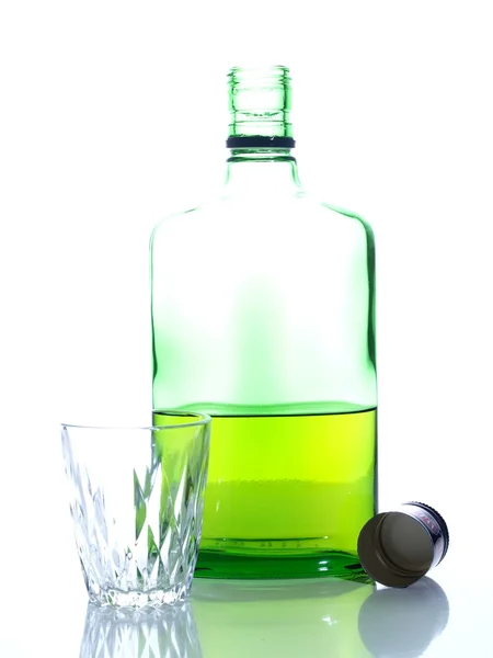 Bottiglia verde su un barlume — Foto Stock