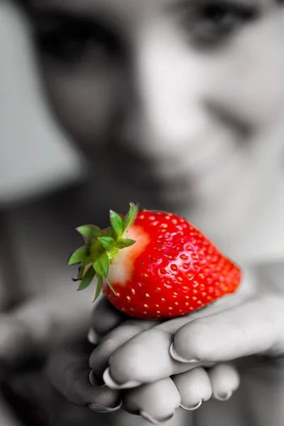 stock image Girl with a fresh juicy strawberry