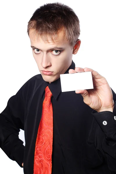 Ung affärsman innehar en tom visitkort — Stockfoto