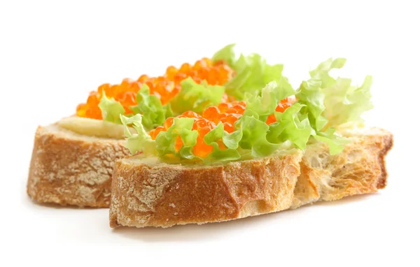 Sandwiches with red caviar and green sal — Stock Photo, Image