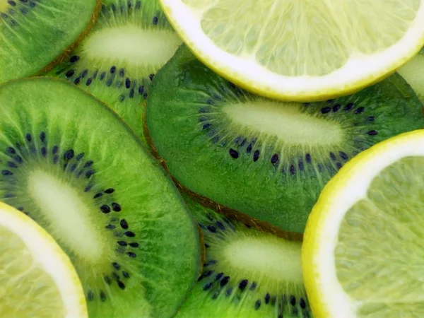 Juicy kiwi and a lemon — Stock Photo, Image