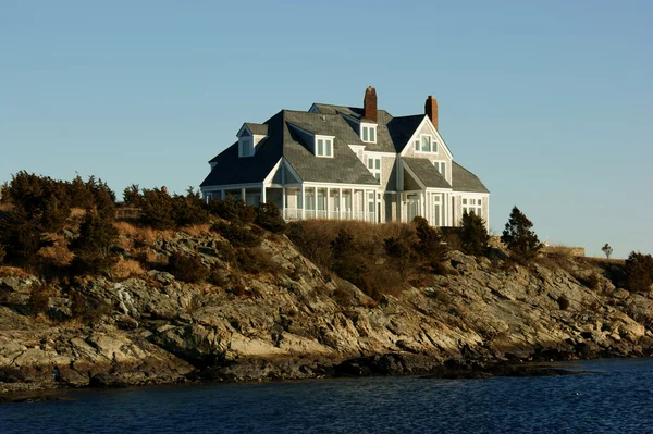 Smoll dům na pobřeží Stock Obrázky