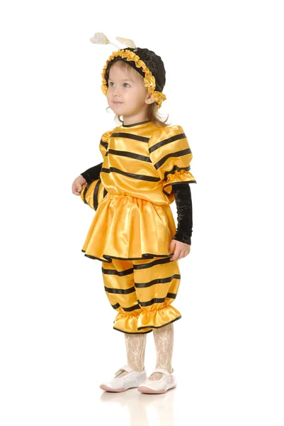 Het kleine meisje in jurk van een honingbij — Stockfoto