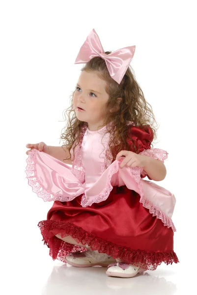 A kislány az ünnepi öltözékben — Stock Fotó