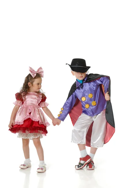Pojke och flicka i festlig klädsel — Stockfoto