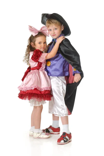 Jongen en meisje in feestelijke kleding — Stockfoto