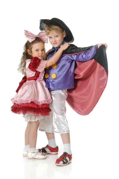Pojke och flicka i festlig klädsel — Stockfoto