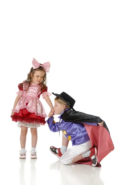Menino e menina em trajes festivos — Fotografia de Stock
