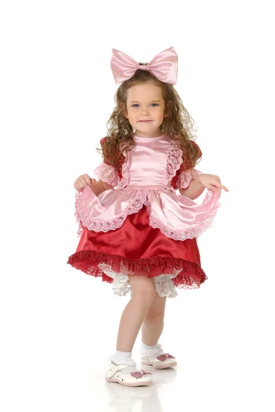 Den lilla flickan i en festlig klädsel — Stockfoto