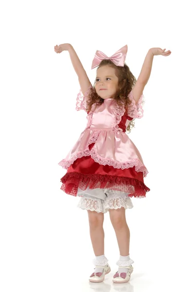 Den lilla flickan i en festlig klädsel — Stockfoto