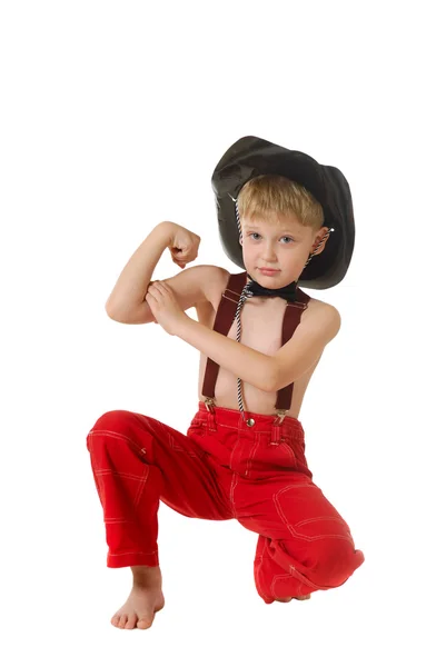 De jongen in kleren van cowboy — Stockfoto