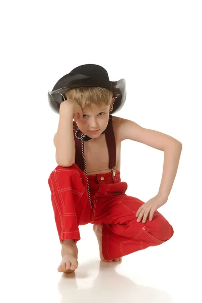 O rapaz de roupa de cowboy — Fotografia de Stock