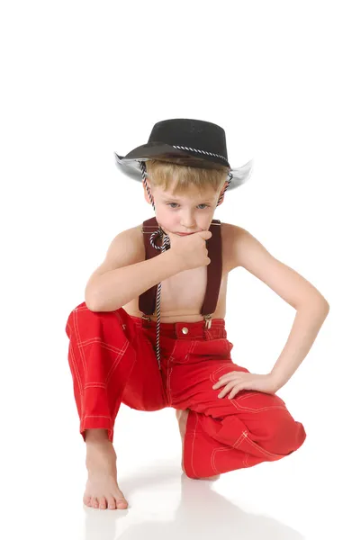 O rapaz de roupa de cowboy — Fotografia de Stock