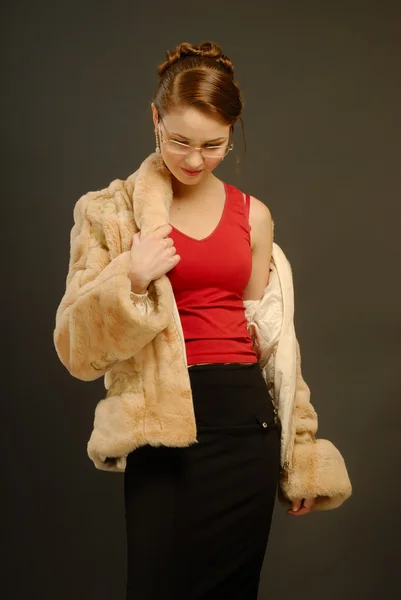 The girl in a fur coat — Stock Photo, Image
