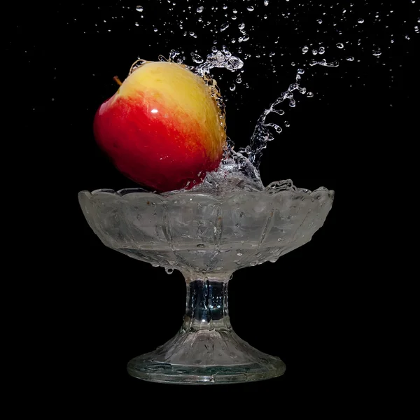 stock image Apple falls into water