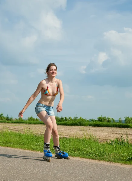 Young girl on roller blades — Stock Photo, Image