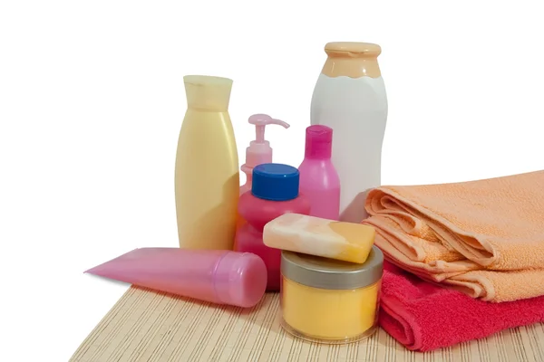 Toiletries with pink towel — Stock Photo, Image