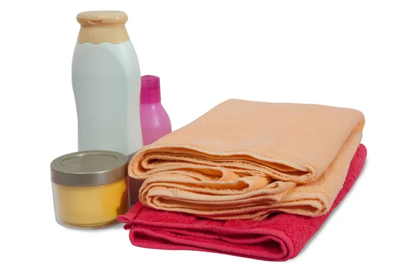Pembe havlu ile banyo ürünleri — Stok fotoğraf