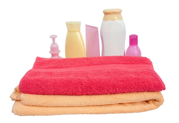 Toaletní potřeby s růžový ručník — Stock fotografie