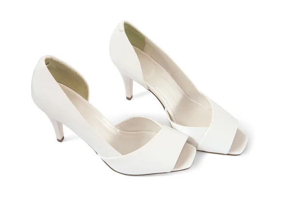 Witte vrouwelijke schoenen — Stockfoto