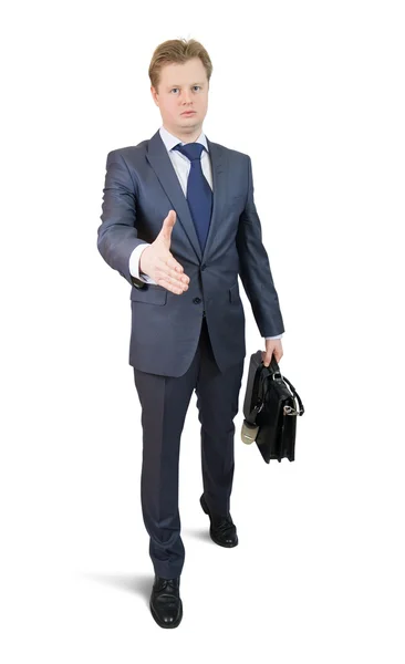 Yendo hombre de negocios ofreciendo un apretón de manos — Foto de Stock