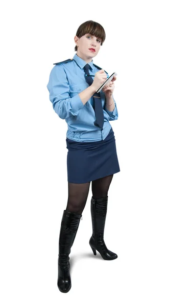 Woman in uniform writing on her notepad — Stock Photo, Image