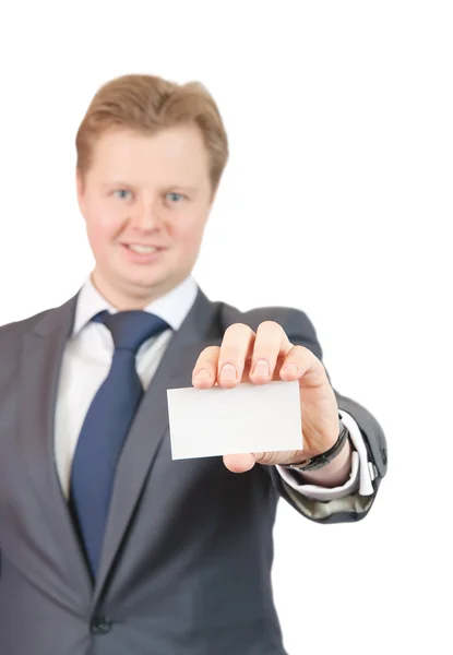 Бизнесмен держит визитку — стоковое фото