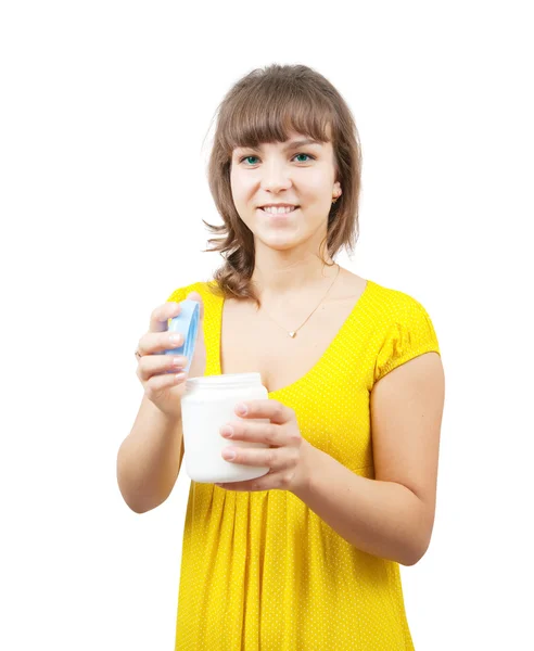 Girl with cosmetic container — Stock Photo, Image